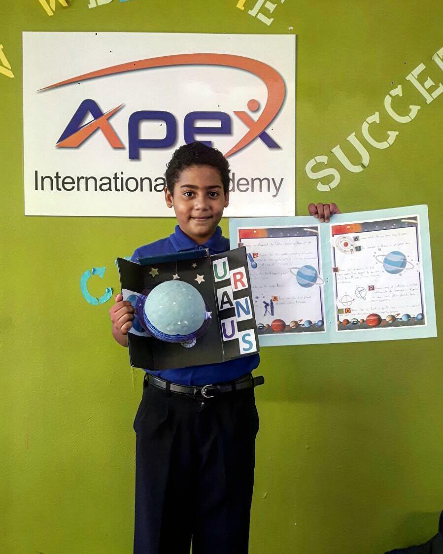 Apex Elementary learner presenting a classroom project